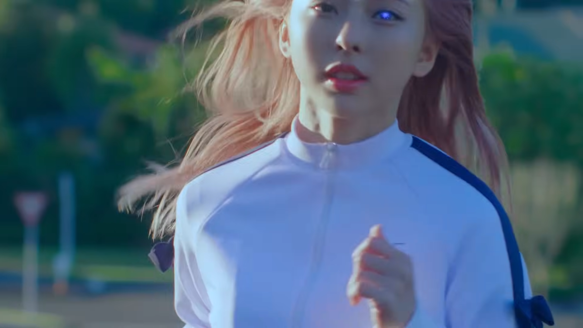 Vivi's left eye glowing purple as she runs.